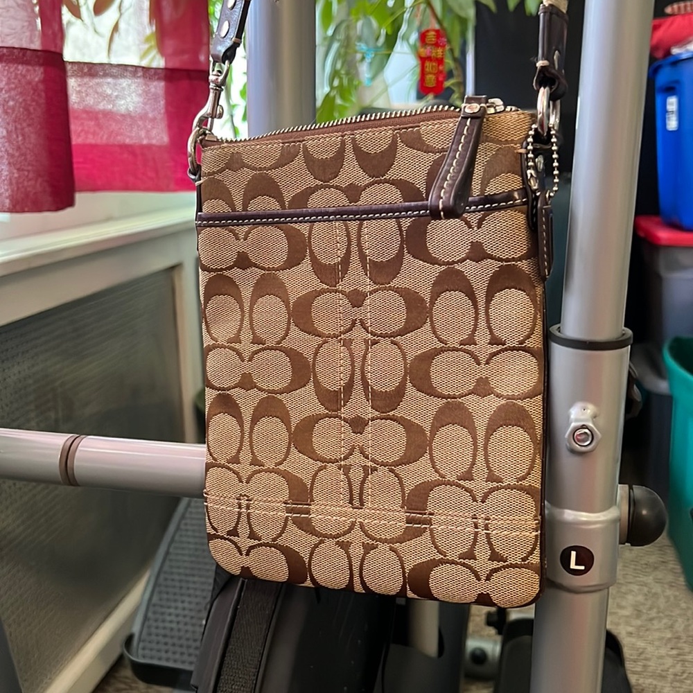 Coach cross body purse.